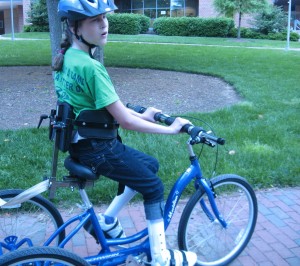 Figure 2: client riding the custom tricycle