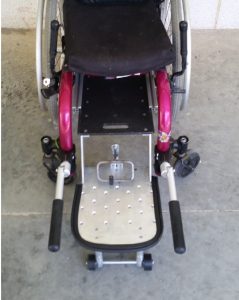 Figure 1: The device mounted to the wheelchair and extended out for use.