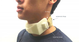 Photo of individual testing the fit of foam collar