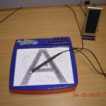 Figure 1: Photo of the device, with a letter A as the tracing area.